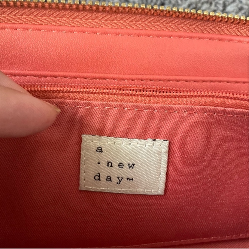 Lightly used salmon colored a.new.day wallet - Picture 3 of 5